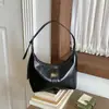 Bolsa de axila com design de nicho estilo francês, novo modelo para o início do outono de 2026, toque de alta qualidade, bolsa de ombro e transversal casual versátil