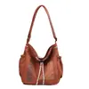 Bolso versátil de pareja moderno y casual, bolso de hombro de nailon resistente al agua para exteriores, bolso cruzado de moda estilo coreano con estampado de letras para el día a día