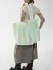 2026 Nueva Bolsa de Compras Rayada Transfronteriza con Alto Valor Estético, Gran Capacidad, Bolso de Mano Ligero, Bolso de Hombro Portátil para Viajes Diarios