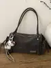 Bolsa Baguete Manual Casual Simples Transfronteiriça para Mulheres Novo Estilo Inverno 2026 Textura de Alta Qualidade Cor Contrastante Bolsa de Ombro Único Sob o Braço