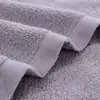 Mayorista de toallas de algodón de color liso para compra de fábrica, empresa de supermercado, uso doméstico, toallas 100% algodón, absorbentes, artículos de regalo, bordado con logo.