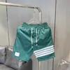 Pantalones cortos de seda helada de verano finos de secado rápido a rayas para hombre estilo coreano modernos casuales pantalones de playa pantalones cortos deportivos para jóvenes
