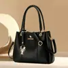 Bolsa versátil para o dia a dia e viagens internacionais, modelo 2026, bolsa para mães, bolsa de mão de cor sólida para mulheres, bolsa tote, bolsa de ombro e transversal estilosa