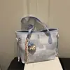 Bolsos de Gran Capacidad para Mujer Primavera y Verano 2026 Nueva Moda Bolso de Hombro para Viajes de Negocios Bolso Tote Cubo de Mano de Alto Valor