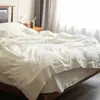 Conjunto de cama de quatro peças 100% algodão estilo japonês, estilo nórdico japonês, lençol branco e capa de edredom ins, adequado para primavera, outono e verão