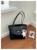 Bolsa de ombro e axila feminina estilo coreano, com laço, novo modelo 2026, textura, pingente de estrela de grande capacidade, moda