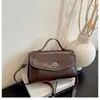 Bolso tote de color sólido, minimalista, nuevo estilo transfronterizo, versátil con cierre de candado, bolso de hombro, elegante y práctico para ir al trabajo, bolso cruzado para mujer