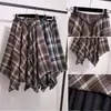 Roupas Femininas Plus Size 2026 Início do Outono Novo Estilo Coreano Xadrez Retrô Design de Bainha Irregular Saia Solta Emagrecedora