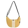 Bolso Cruzado de Lona Casual para Mujer 2025 Nuevo Bolso de Viaje Casual Ligero Almacenamiento Versátil Deportivo Nylon Dumpling Bag