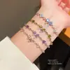 Pulsera con colgante de lazo de circonita estilo coreano para mujer, pulsera de lujo ligero de alta gama, joyería de diseño de nicho de moda al por mayor