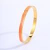 Pulsera de Acero de Titanio Moda Transfronteriza Europea y Americana Pulsera Esmaltada con Goteo de Aceite para Mujer con Sensación de Alta Gama Pulsera Electrochapada en Oro Real de 18 Quilates