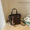 Bolsa de Moda para Mujer Estilo Coreano Verano 2026 Bolso Cruzado de Moda Bolso Cubo de Color Sólido de Alto Valor Personalizado