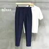 Pantalones transpirables de corte slim de alta gama estilo británico 2026, pantalones para hombre de color liso talla grande, pantalones versátiles de verano de corte slim