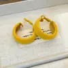 Brincos Redondos Flocados Ankora Vermelhos de Ano Novo para Mulheres Outono e Inverno Brincos Clássicos Versáteis Luxo Acessível Brincos Elegantes para Mulheres Ferro