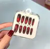 Nuevo producto transfronterizo: Puntas de Uñas Ojo de Gato Color Rojo Vino Cereza Rojo Profundo Bombilla, Caja de 10 Piezas con Tallas Codificadas, Puntas de Uñas Portátiles Ojo de Gato