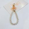 Llavero Colgante de Cadena de Perlas DIY con Lazo Nueva Flor de Metal Accesorios para Tarjetas Bolsa de Audífonos Accesorios para Llaves Femeninos