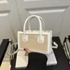 Bolsos pequeños de color contrastante populares de este año para mujer 2025 Nueva primavera y verano Super popular Bolso cruzado versátil Bolso de mano de moda