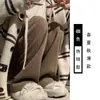 Pantalones casuales de espiga suaves talla grande 150 kg para hombre y mujer, finos de cintura alta de pierna ancha fluidos primavera/verano 2026