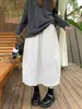Nueva falda midi de estilo coreano para mujer para otoño e invierno con cintura elástica, falda calabaza, holgada y estilizada, versátil falda midi de línea A
