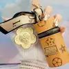 Chaveiro Pingente de Celular de Ouro Ouro Puro 999 com Teor de Ouro, Símbolo de Dinheiro, Caixa de Presente Paz e Alegria, Presente Souvenir, Pequeno Presente
