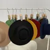 Sombrero de copa francés de lana para mujer Otoño e Invierno 2023 Nuevo Sombrero plano de socialité británica Sombrero de fieltro retro de ala plana estilo Hepburn