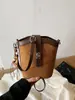 Bolso Cubo Retro de Bloques de Color de Moda con Cierre de Giro para Mujer 2025 Nueva Moda de Primavera Bolso de Hombro Cruzado Patchwork de Nicho
