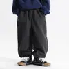 Pantalones largos para niño, nueva colección otoño 2026, pantalones casuales estilo coreano, corte holgado y relajado, adecuados para niños pequeños y mayores, con puños elásticos, versátiles y fáciles de combinar
