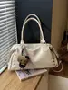 Bolsa tipo Boston de alta gama y gran capacidad para mujer, nueva colección otoño/invierno 2026, adecuada para ir al trabajo y uso casual, se puede llevar como bolso de hombro o bolso cruzado
