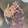 Verano Lujo Ligero Morado Láser Colorido Cuentas Heidi Cadena para Teléfono Móvil Colgante de Muñeca Portátil Anti-pérdida Cadena para Funda de Teléfono Móvil Creativa