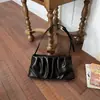 Bolsa de Axila Design de Nicho Feminina 2026 Nova Moda de Verão Bolsa de Ombro Único Nicho Super Popular Bolsa Transversal Nuvem