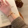 Popular Joyería de Hilo Rojo con Forma de Calabaza de Xiaohongshu, Exquisita y de Moda, Estilo Versátil, Realza el Tono de Piel, Sensación de Alta Gama, Pulsera, Venta al por Mayor de una Sola Pieza