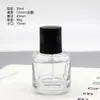 Venta al por mayor de fábrica En stock Botellas de perfume transparentes de cristal de 30 ml, Botellas dispensadoras de vidrio, Botellas pulverizadoras, Botellas cosméticas vacías de presión