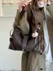 Bolso de hombro único de color liso, muy elegante y retro, modelo nuevo de otoño 2026, bolsa tote de gran capacidad para el trabajo y los desplazamientos