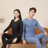 Ropa interior térmica de seda para hombre y mujer, cachemir, resistente al frío, fina, para otoño e invierno, conjunto de mallas largas