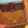 Pulsera Puzuo Qiang Protección de Color Oro Arena Gordita Fu Jin Tuo Tuo Año Nuevo Chino Zodiaco Cuerda Roja Pulsera Tejida a Mano para Mujer
