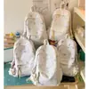 Mochila de aspecto elegante estilo coreano, estilo Ins, para estudiantes mujeres, bolsa escolar linda de dibujos animados de gran capacidad, mochila ligera y simple