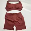 En Stock Dfyne Mismo Estilo Conjunto de Yoga de Alta Elasticidad Sujetador Halter y Conjunto de Shorts Conjunto de Yoga Fitness sin Costuras