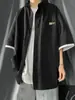 Camisa de manga corta de estilo Hong Kong ins de dos piezas falsas para estudiantes varones, holgada y versátil, chaqueta camisa de manga tres cuartos a la moda
