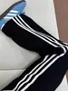 Pantalones Deportivos de Rayas Pierna Recta para Hombre y Mujer Primavera y Otoño Ropa Urbana Americana Pantalones Cleanfit Sueltos Pierna Ancha Casual Largos