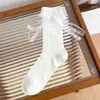 26 calcetines blancos hasta la pantorrilla, calcetines finos de malla de encaje de algodón para primavera y verano, calcetines holgados estilo ballet con lazo y diseño calado Lolita