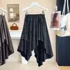 Ropa de mujer talla grande colección otoño/invierno 2026: falda retro de gamuza a cuadros asimétrica con cintura ceñida para un efecto adelgazante