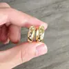 Pendientes Redondos de Circonita de Lujo Ligero Más Vendidos Transfronterizos Moda Nicho Pendientes Chapados de Gama Alta para Mujer Venta al por Mayor