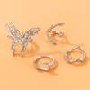 Joyería de comercio exterior de Amazon anillo creativo de mariposa geométrica de metal pesado personalidad irregular juego de cuatro anillos