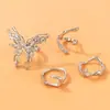 Joyería de comercio exterior de Amazon anillo creativo de mariposa geométrica de metal pesado personalidad irregular juego de cuatro anillos