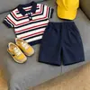 Roupa Infantil Coreana 2026 Verão Novo Estilo Estilo Universitário Listrado Contrastante Gola Polo Tricô Manga Curta Shorts Azul Marinho Infantil