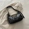 Bolso de motocicleta para mujer 2026 nuevo bolso de moda tipo dumpling versátil bolso de axila bolso de media luna para el día a día bolso de hombro cruzado texturizado