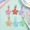 Novo Chaveiro de Flor Colorido Vazado Transparente Pingente de Joia DIY Versátil Criativo Charme para Bolsa Feminina
