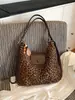 Bolsa tote de nicho transfronteiriça com estampa de leopardo retrô para mulheres, nova bolsa de ombro simples e versátil da moda 2026, mochila fashion