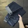 Calça Jeans Bordada de Alta Qualidade para Primavera e Outono Masculina 2026 Nova Marca Tendência Slim Perna Reta Calças Longas Outono Elásticas Casuais