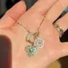 Libro rojo pequeño explosiones girasol corazón en forma de colgante DIY moda lujo brillante estrella de la noche diamante collar una generación de cabello